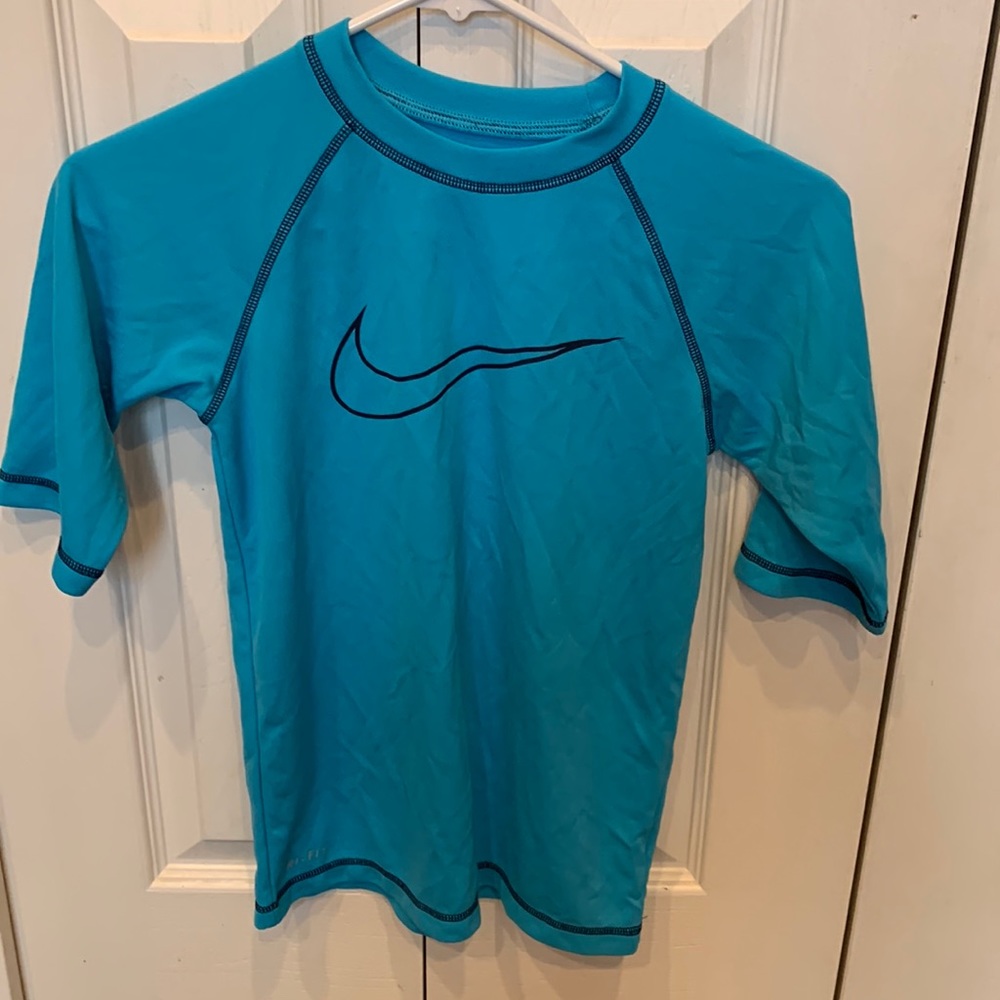Nike Dri-Fit swim shirt. Kids size M